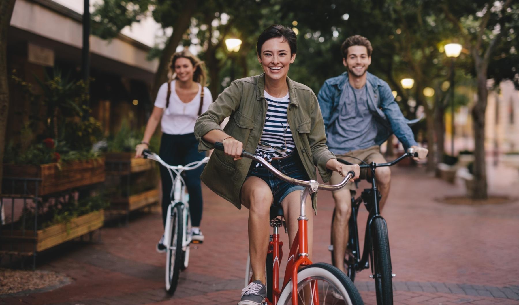 a group of people riding bikes