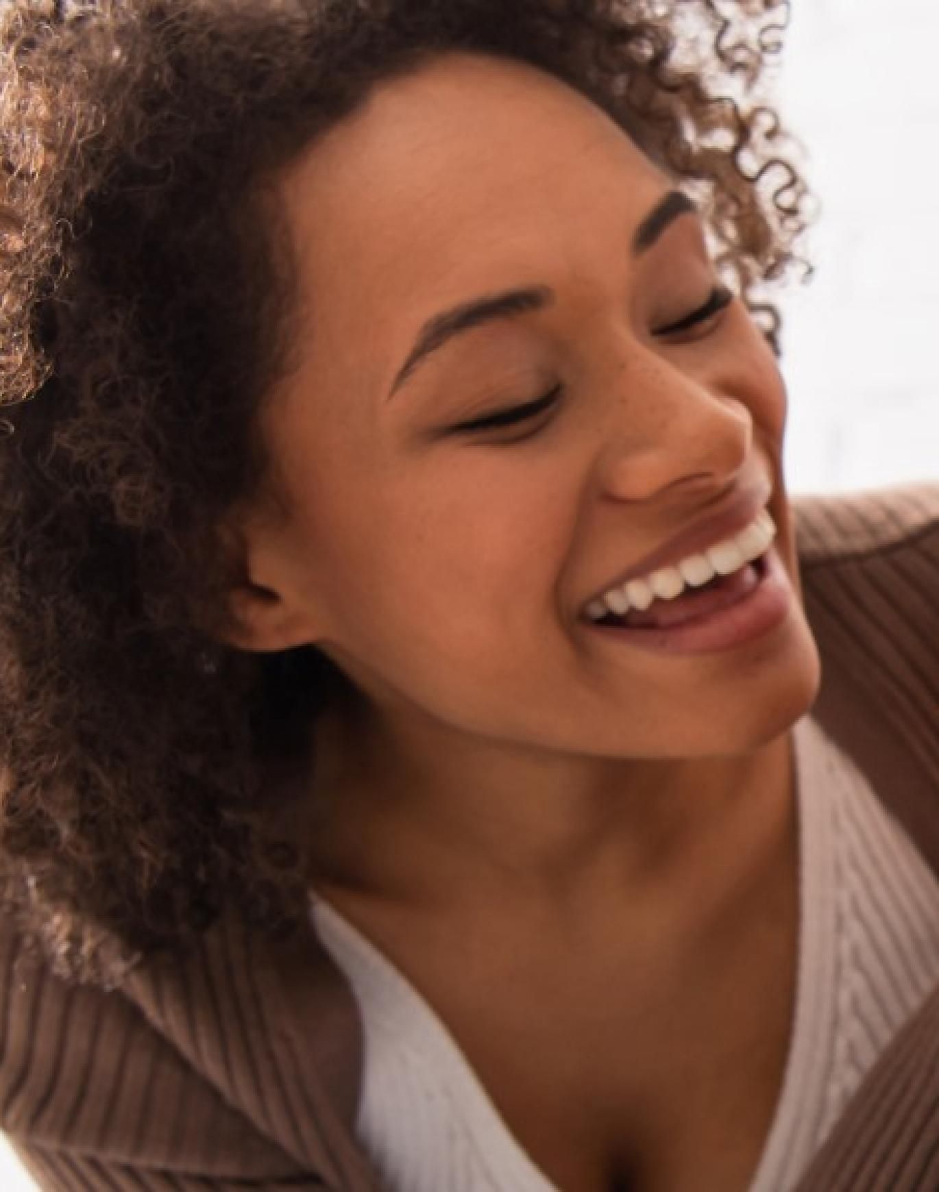 a man and woman with a dog
